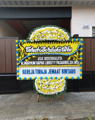 Papan Bunga Duka di Tenggulun